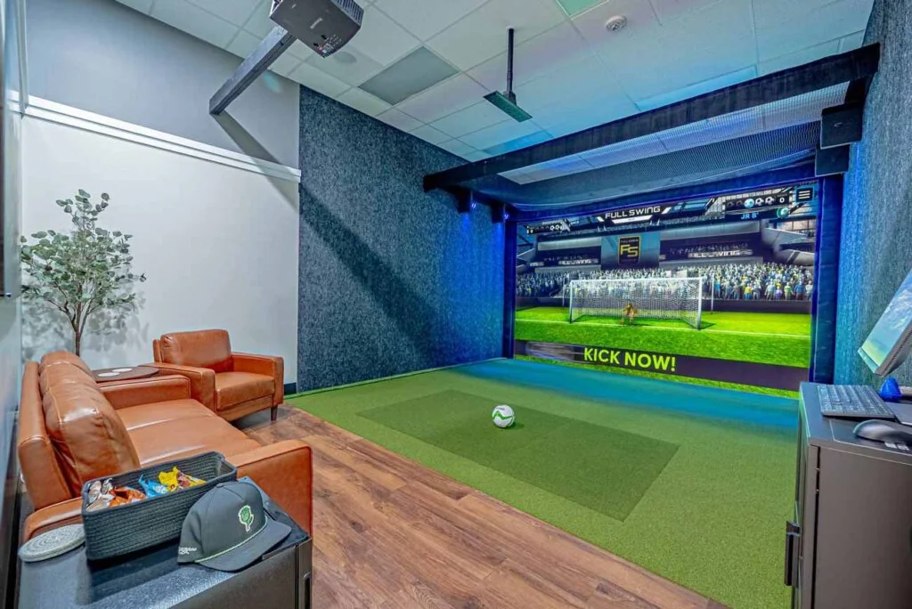 A social golf night inside a Rozay Golf simulator bay